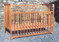 Drop side cot made from reclaimed Pitch Pine